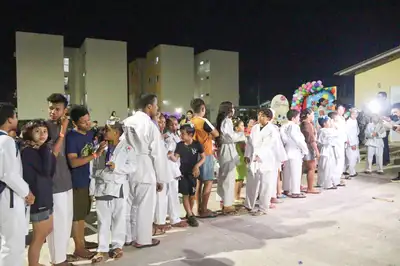 notícia: Artes marciais de judô e capoeira marcam o mês das crianças no Residencial Miracema em programação do Governo do Amapá