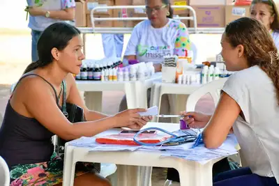 notícia: Governo do Amapá leva atendimentos de saúde e odontologia durante comemoração de 14 anos do Residencial Mucajá