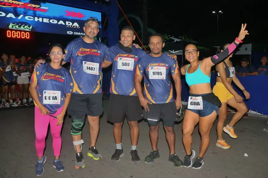 Os atletas da catoria PCDs com atletas-guia. 