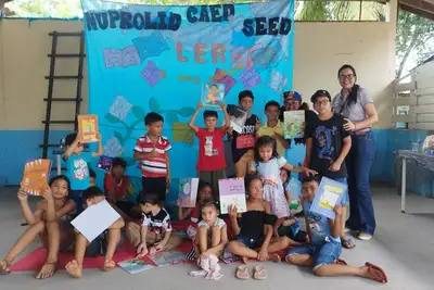 notícia: Projeto de incentivo à leitura leva diversão e conhecimento às crianças durante o 'Governo em Ação' no bairro Brasil Novo, em Macapá 